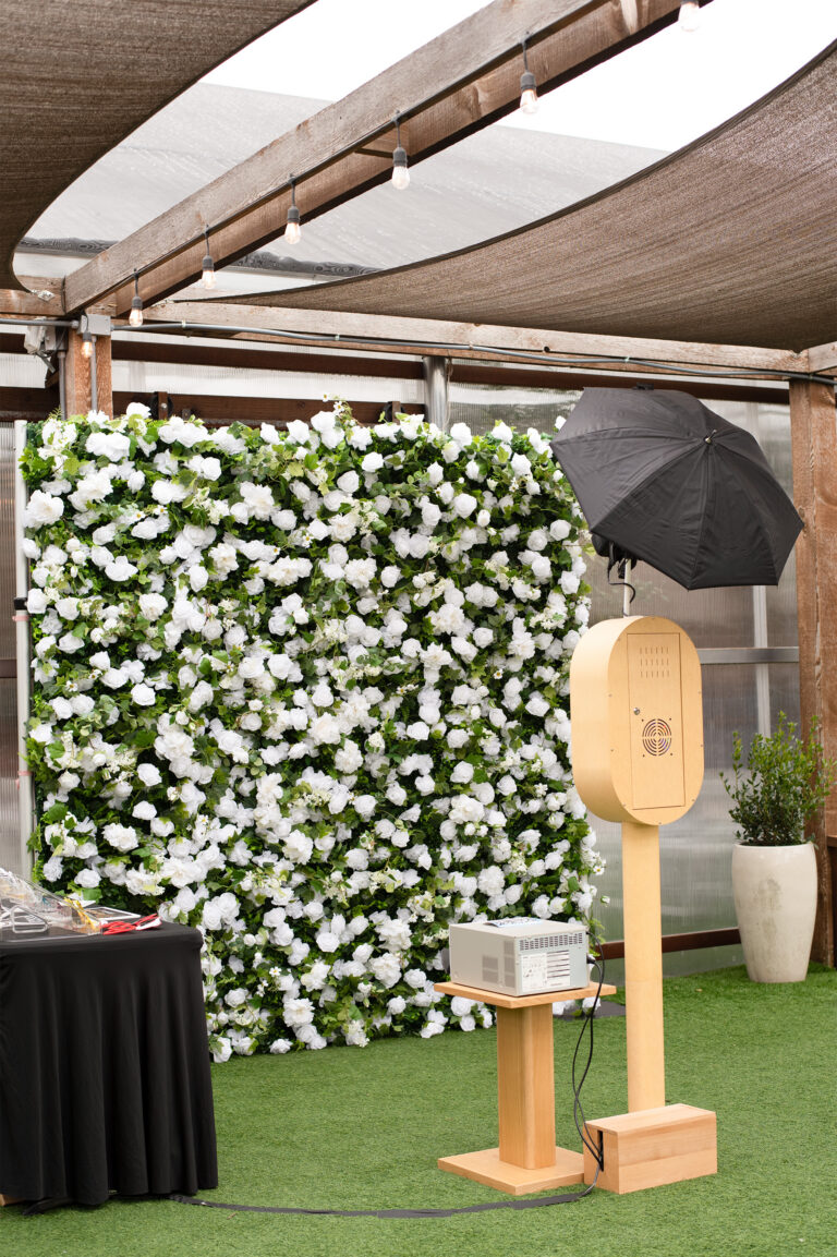 DLS booth with flowerwall 768x1153