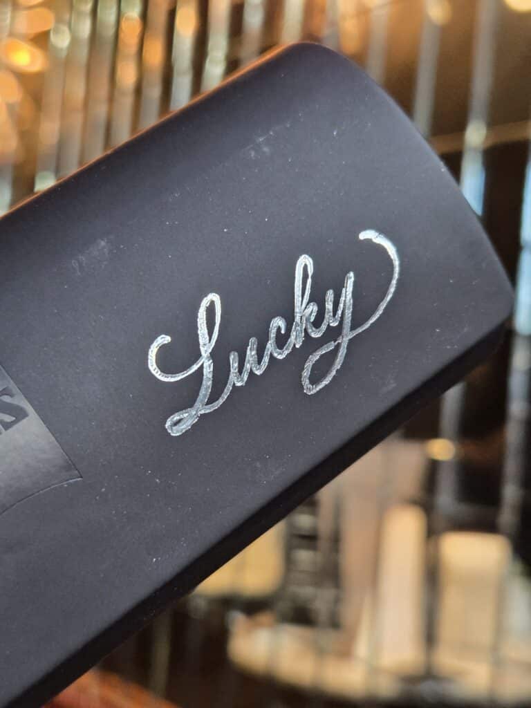 Hot foiling on black sunglass case Handwritten by Belle 768x1024